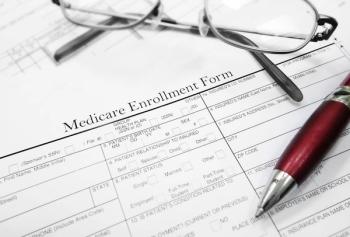 Medicare enrollment form Image credit: AdobeStock/zimmytws