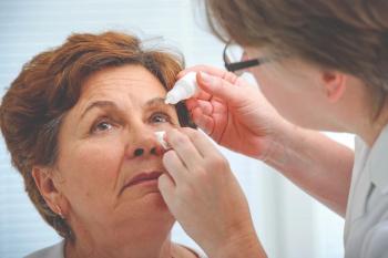 Woman receiving eye drops Image credit: AdobeStock/AlexanderRaths