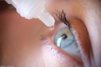 Woman administering eye drop Image credit: AdobeStock/megaflopp