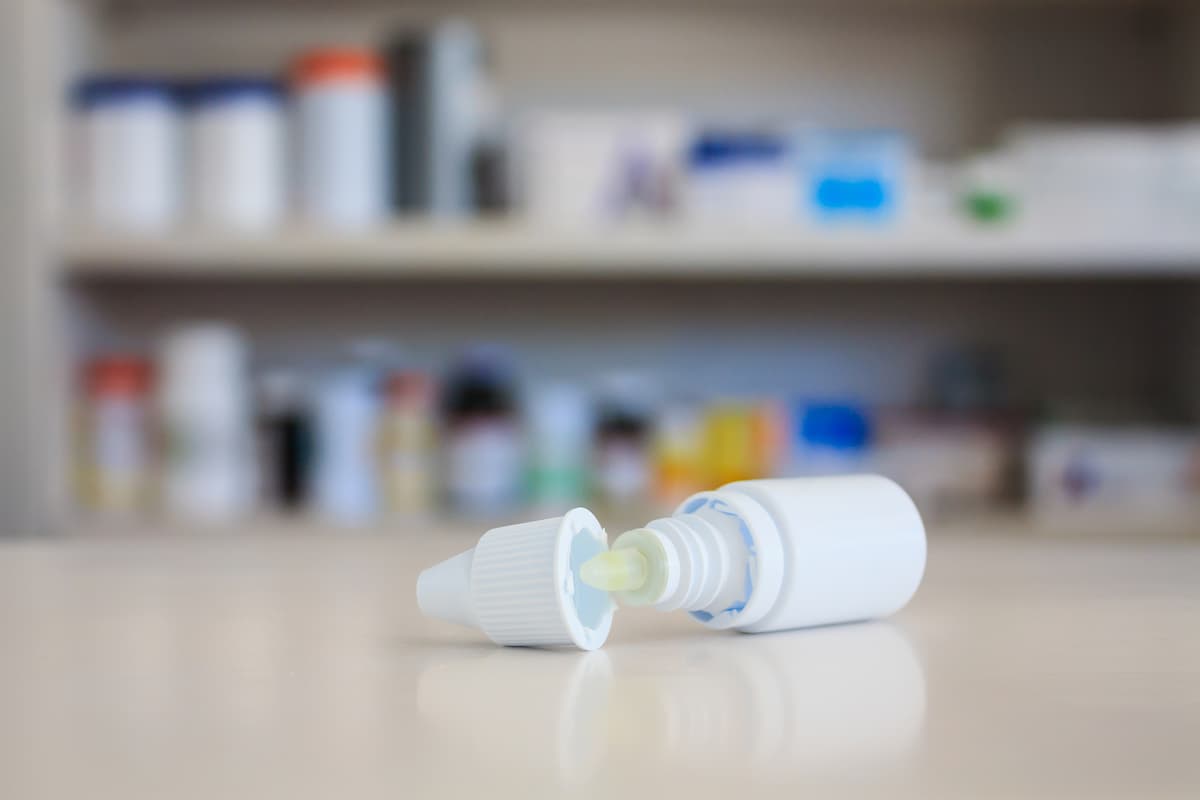 Eye drop container on OTC counter Image credit: AdobeStock/Kwangmoozaa