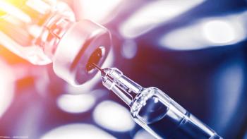 Needle being filled from vial Image credit: AdobeStock/Trsakaoe