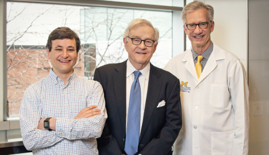 From left to right: Jason M. Miller, M.D., Ph.D., James Grosfeld and Mark W. Johnson, M.D., at the University of Michigan Health W.K. Kellogg Eye Center.