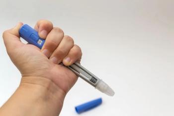 GLP-1 delivery system in hand Image credit: AdobeStock/YuliaAntonova