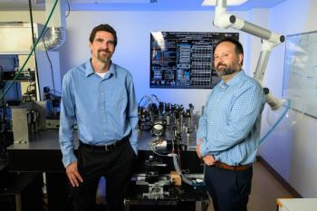 Assistant Professor of Ophthalmology Jesse Schallek, PhD, right, and lab manager Derek Power, MS, in their lab in the University of Rochester’s Flaum Eye Institute. Image credit: J. Adam Fenster / University of Rochester