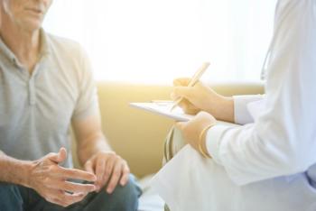 doctor counseling older male patient