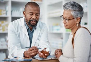 Pharmacists May be the Health Care Professionals Best Suited to Treat Hypertension / image credit pharmacist counseling: ©Clayton D/peopleimages.com/stock.adobe.com