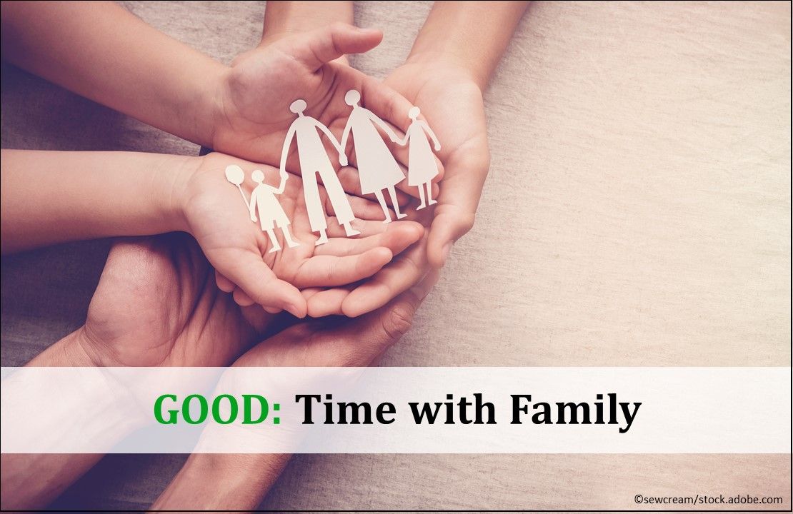 Adult and children hands holding paper family cutout, family relationships