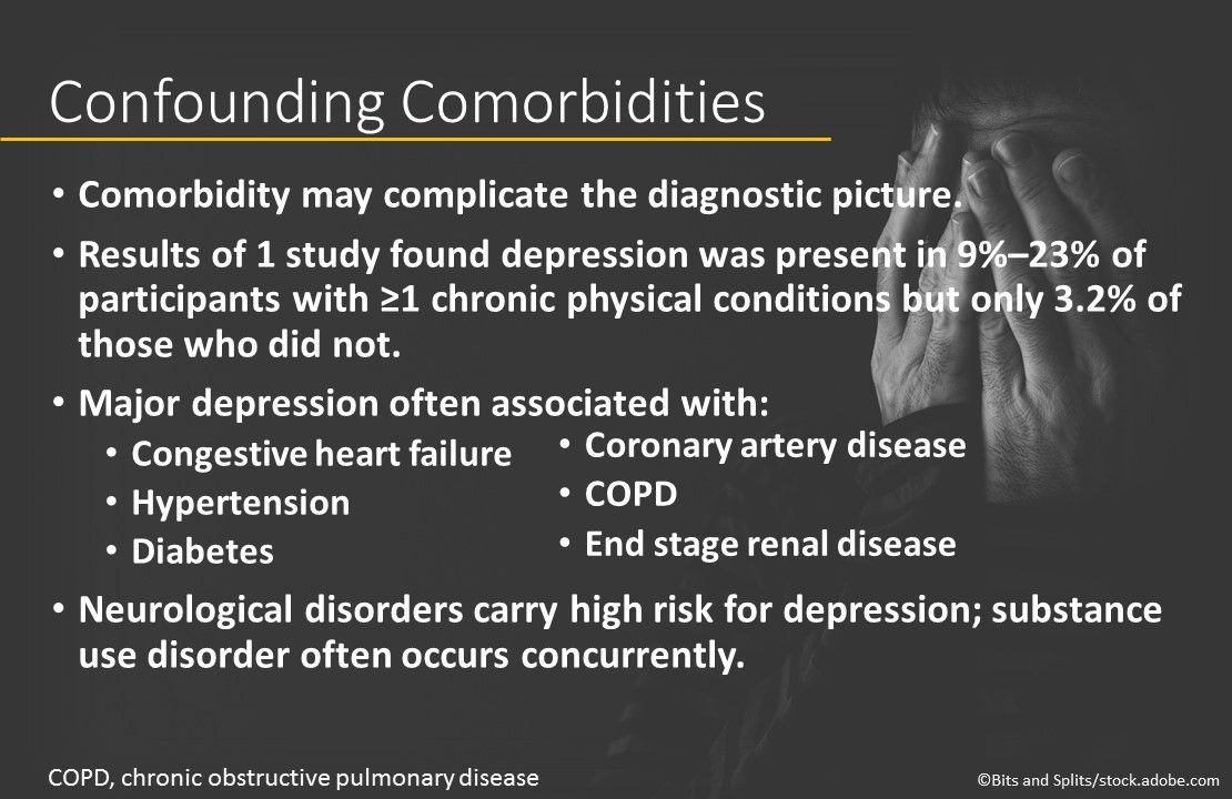 man suffering from depression holding hands over face
