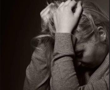 Migraine-related Stigma is Common and Impacts Level of Disability, Quality of Life image credit woman in pain: ©itsmejust/stock.adobe.com