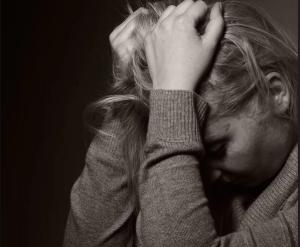 Migraine-related Stigma is Common and Impacts Level of Disability, Quality of Life image credit woman in pain: ©itsmejust/stock.adobe.com