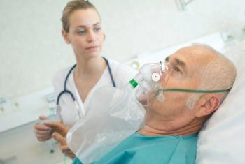 RSV Disease Severity Comparable to Unvaccinated COVID-19, Influenza: New Research / image credit older man in hospital ©auremar/stock.adobe.com