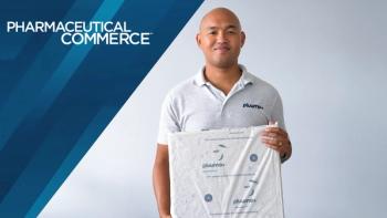 Ryan Robinson, Ph.D., CEO and founder of Aeropowder, holds a PluumoPlus panel. Courtesy of Aeropowder.