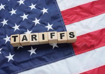 Import Trade Tariffs increase concept with United States of America Flag. Trade wars | Andrii - stock.adobe.com 1222539989