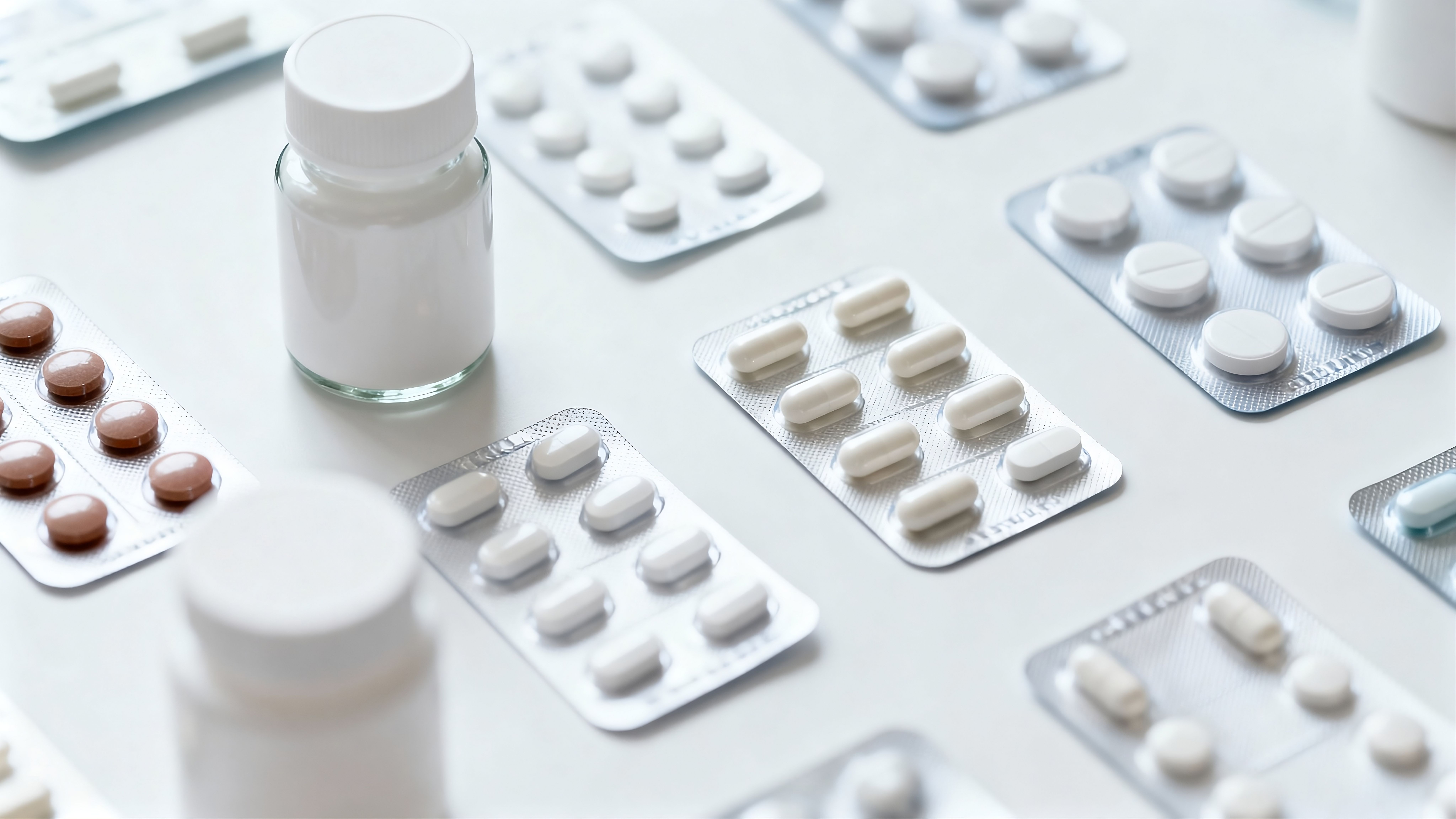 Blister pack with generic medical tablets on white background, pharmacy and healthcare concept. | Bogdan - stock.adobe.com 1864767552