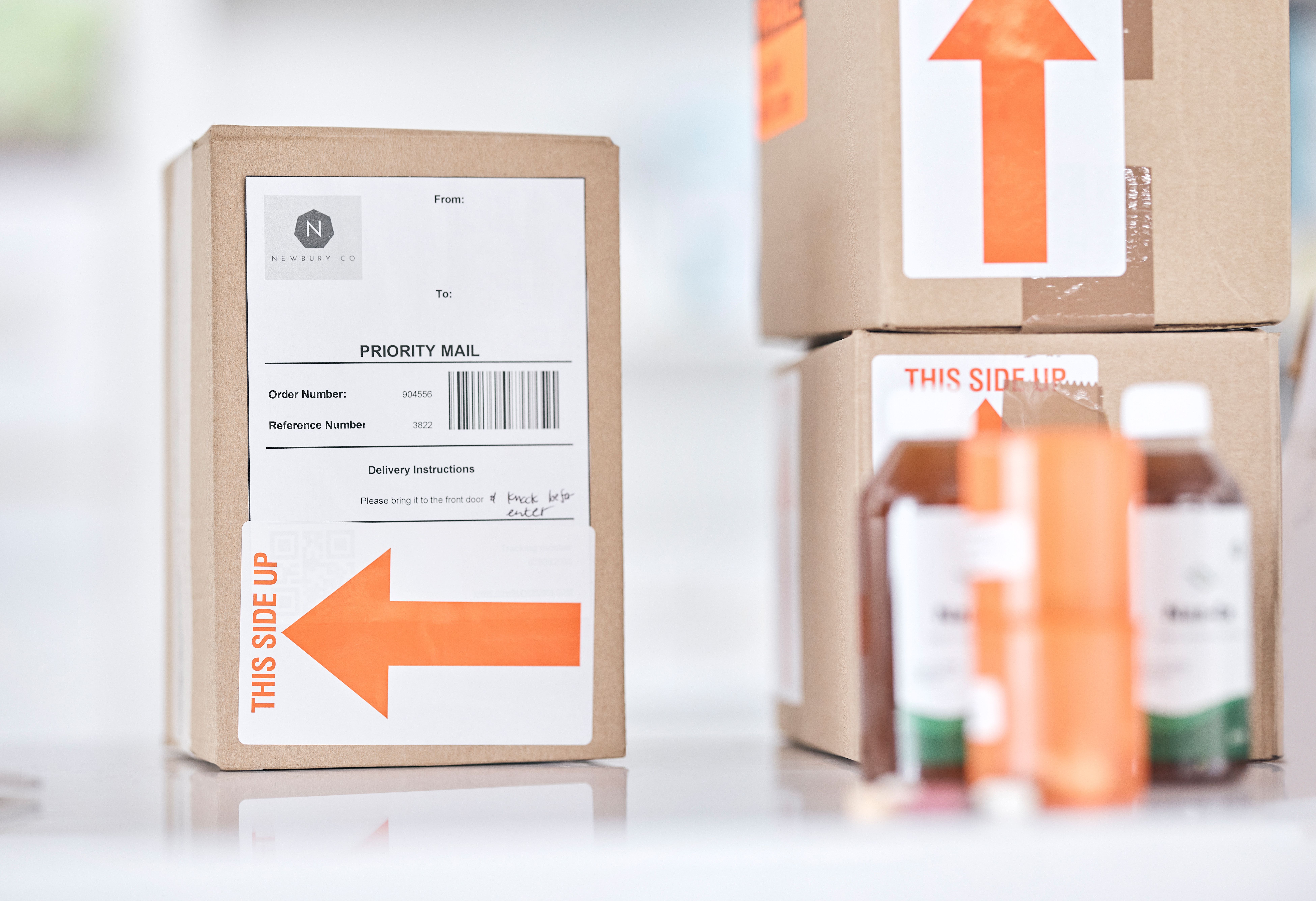 Boxes, medicine and delivery package in pharmacy for ecommerce, supply chain and healthcare on blurred background. Stock, logistics and medical product or drug distribution for health and wellness | ©  Phindulo T/peopleimages.com - stock.adobe.com
