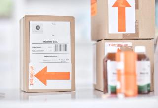 Boxes, medicine and delivery package in pharmacy for ecommerce, supply chain and healthcare on blurred background. Stock, logistics and medical product or drug distribution for health and wellness | ©  Phindulo T/peopleimages.com - stock.adobe.com