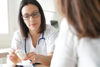 Doctor prescribing medication to patient - Image credit: Goodluz | stock.adobe.com