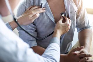 Doctor using a stethoscope checking patient with examining, presenting results symptom and recommend treatment method, Healthcare and medical concept - Image credit: Ngampol | stock.adobe.com 