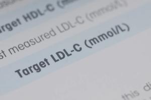 A medical document with the words "Target LDL-C" highlighted in blue, illustrating the importance of monitoring low-density lipoprotein for cardiovascular health. | Image Credit: TeacherPhoto | stock.adobe.com