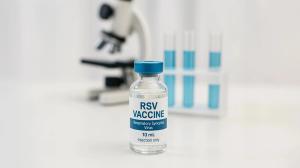 RSV Respiratory syncytial virus vaccine vial on laboratory table with scientific research background - Image credit: AiDesign | stock.adobe.com