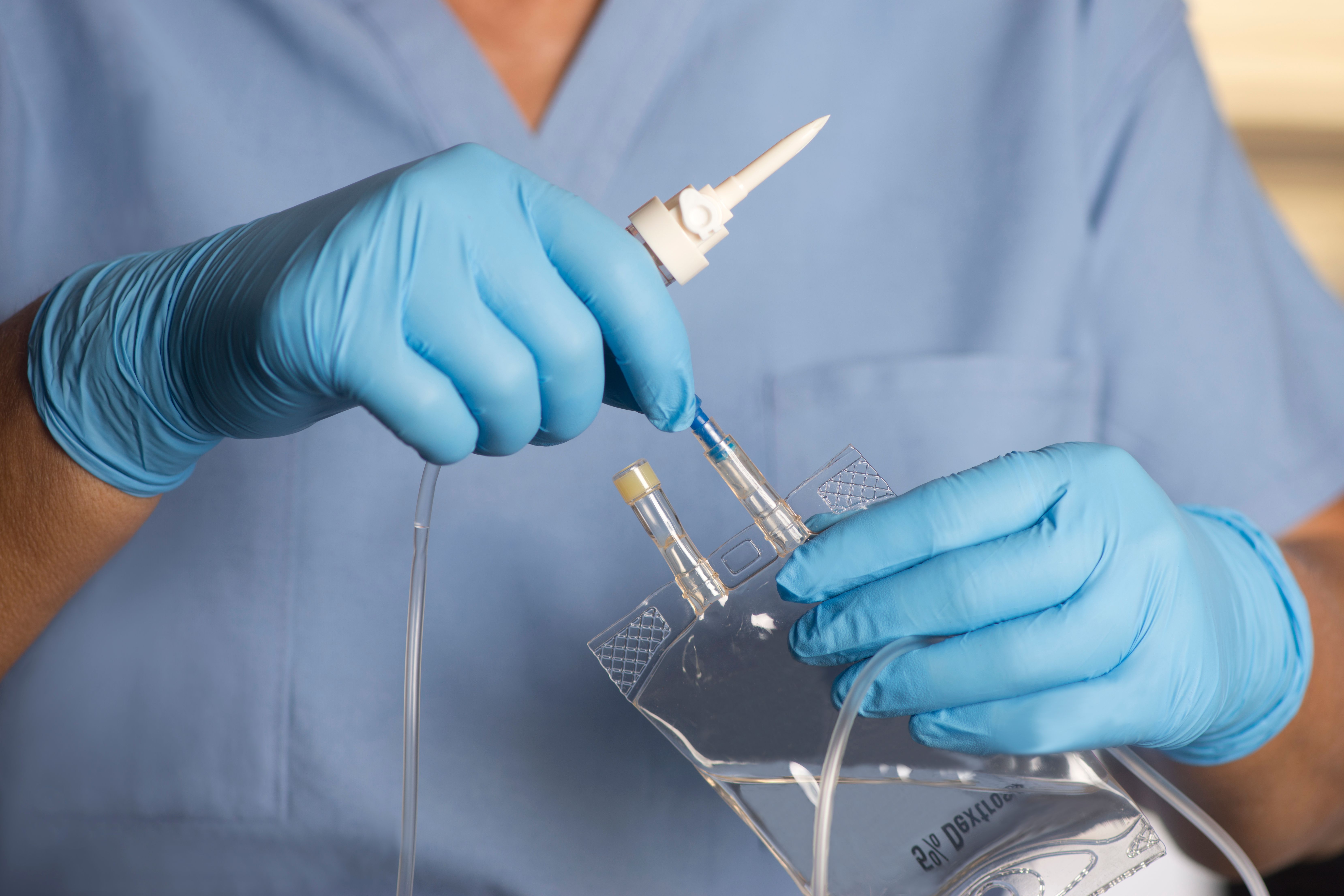 Nurse preparing dextrose infusion | Image Credit: © Sherry Young - stock.adobe.com