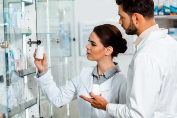 Pharmacists working in a pharmacy -- Image credit: LIGHTFIELD STUDIOS | stock.adobe.com