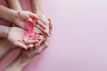 hands holding pink ribbons, Breast cancer awareness and October Pink day, world cancer day | Image Credit: Sewcream Studio | adobe.stock.com