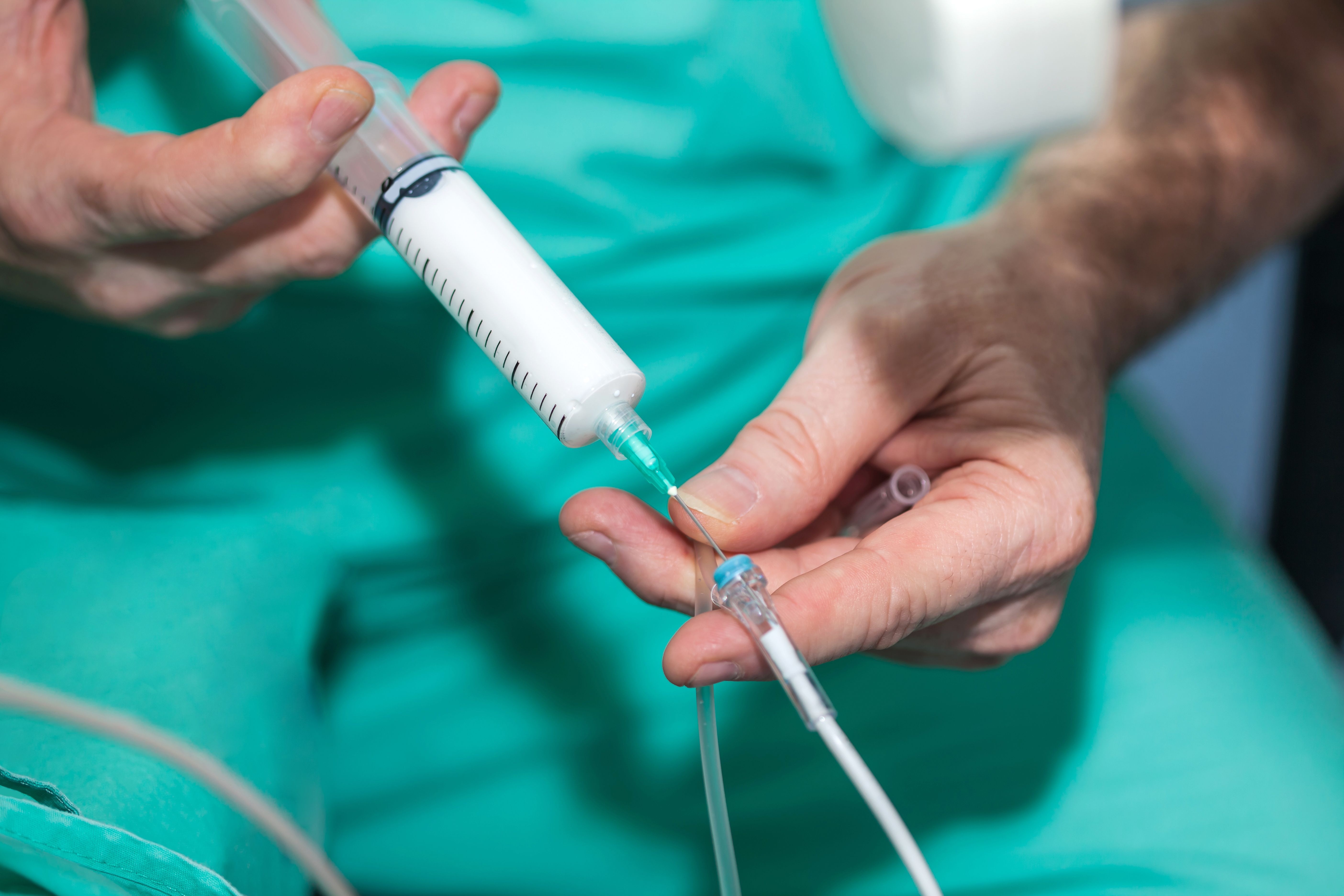 Patient receiving injection before surgery -- Image credit: anamejia18 | stock.adobe.com