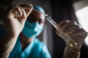 Doctor holding a coronavirus COVID-19 test tube - Image credit: bizoo_n | stock.adobe.com 