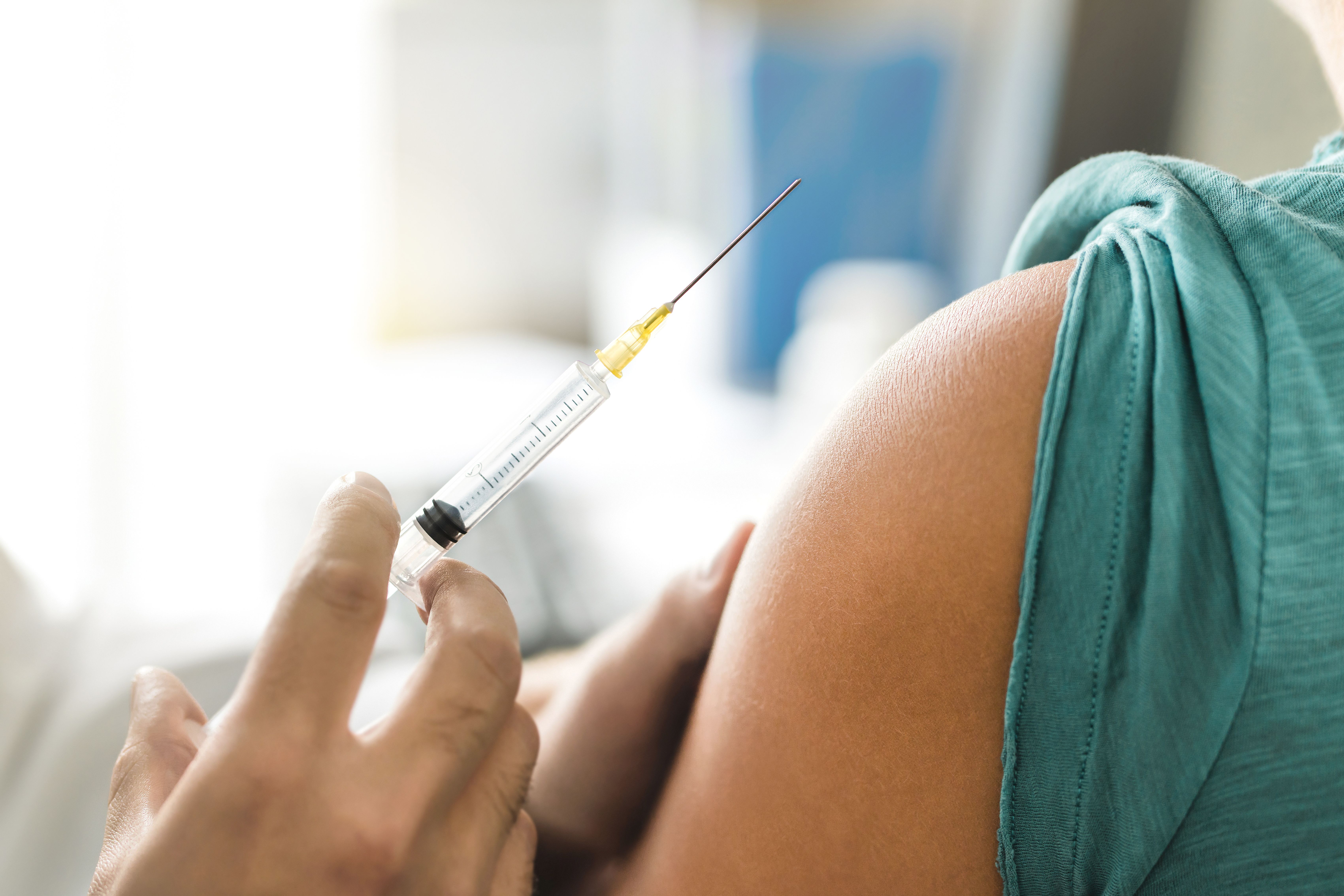 Patient receiving an injection -- Image credit: terovesalainen | stock.adobe.com