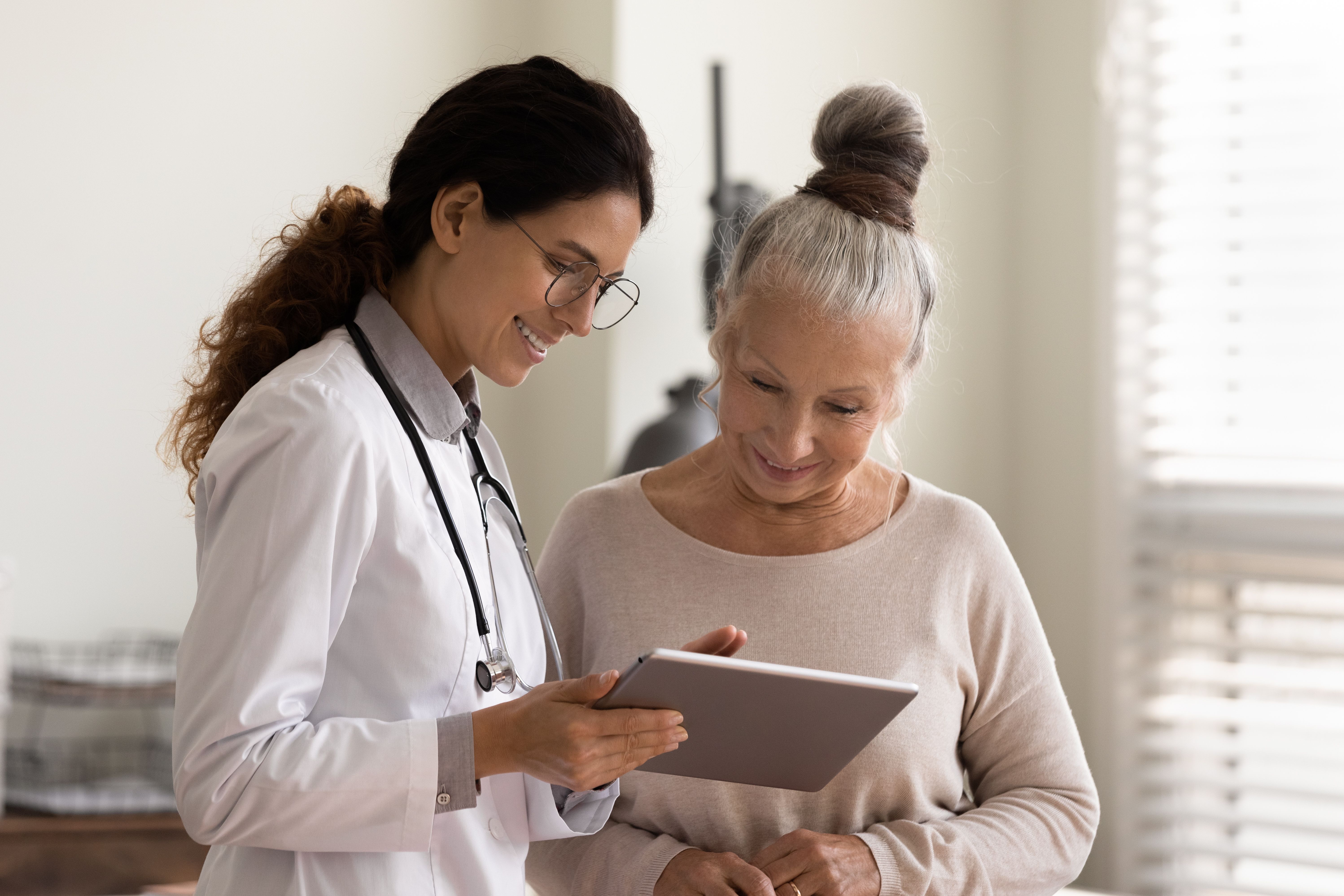 Woman at a doctor's appointment -- Image credit: fizkes | stock.adobe.com