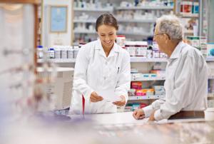 Everyone of my clients are special. Shot of a pharmacist helping a customer at the prescription counter. | Image Credit: Yuri Arcurs/peopleimages.com | stock.adobe.com