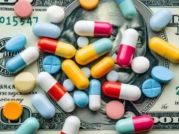 Medical costs and treatment expenses with colorful pills and capsules on US dollar bill for health insurance concept, private medical insurance costs and rising medical expenses - Image credit: LilithArt | stock.adobe.com