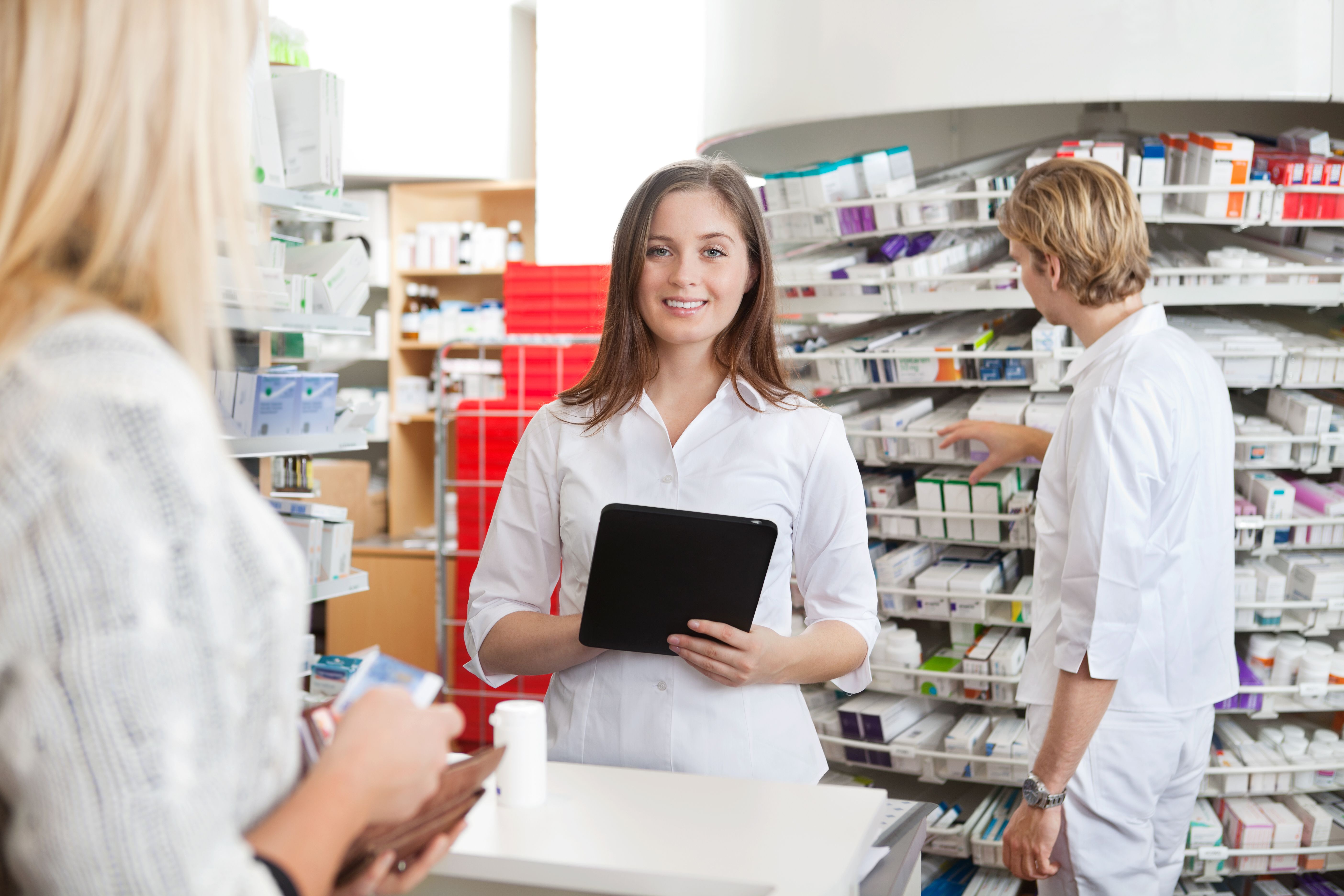 Female Pharmacist Holding Tablet PC - Image credit: Tyler Olson | stock.adobe.com