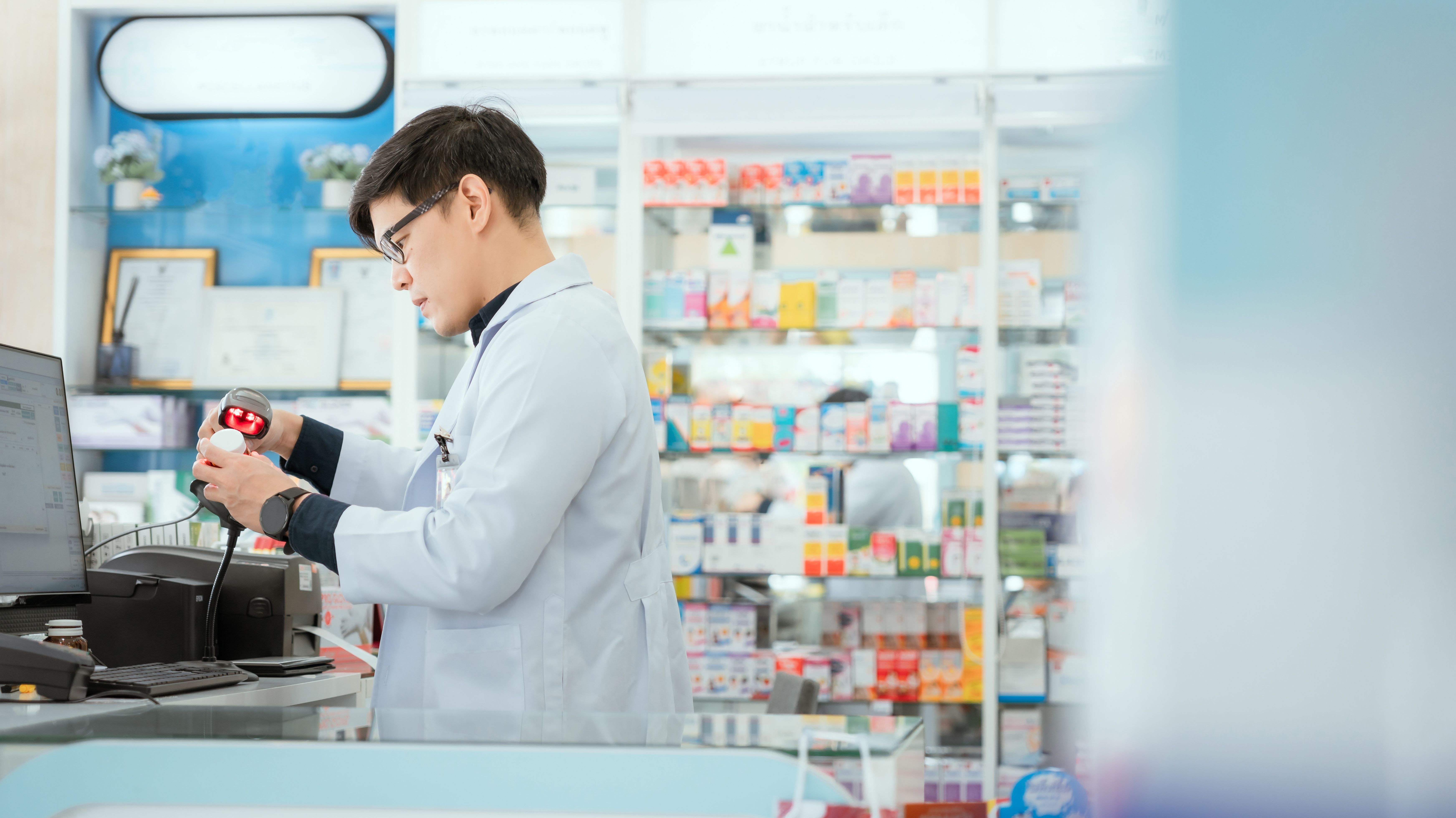 pharmacist checks drug stocks in a community pharmacy - Image credit: 2B | stock.adobe.com
