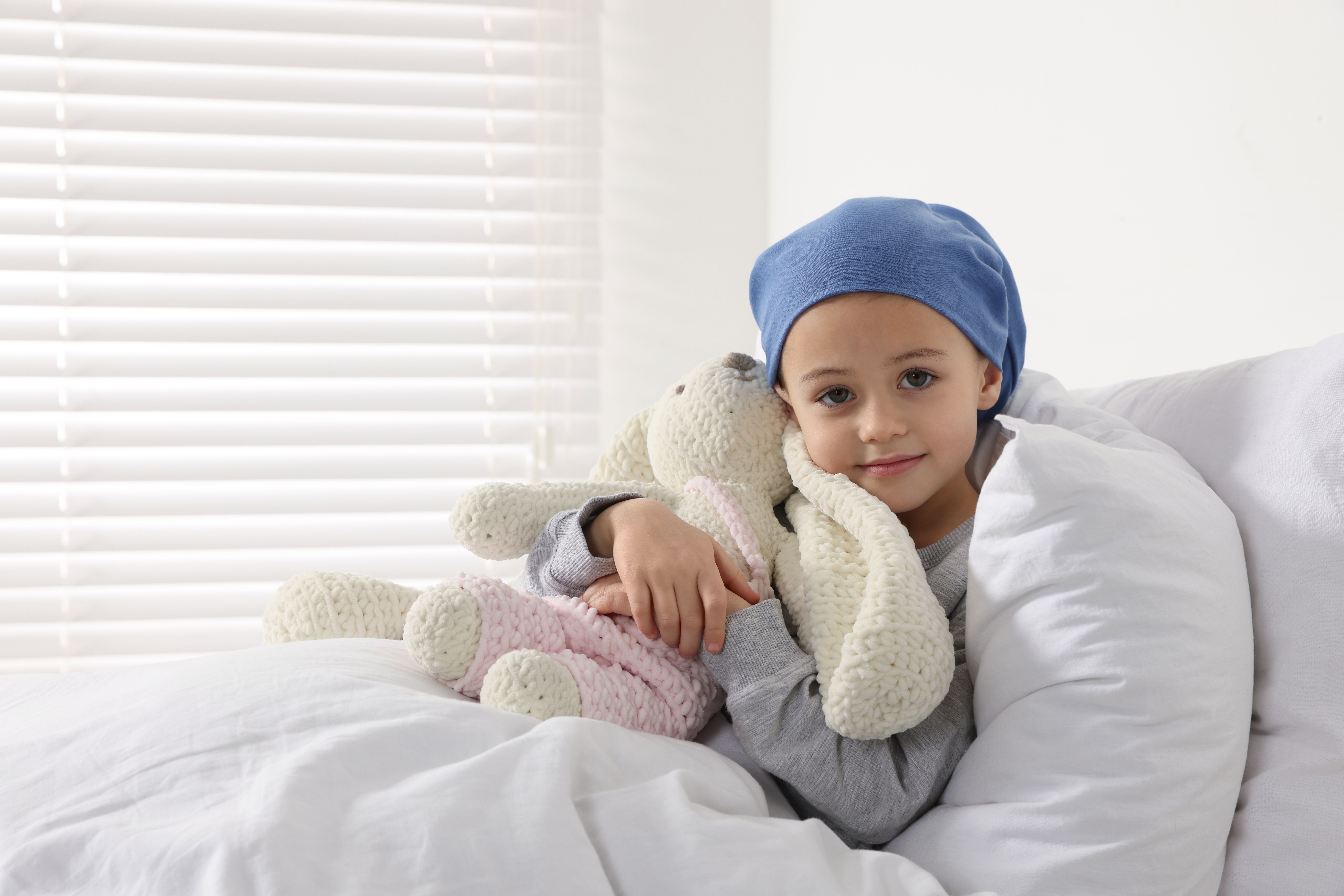Young girl in hospital with cancer -- Image credit: New Africa | stock.adobe.com