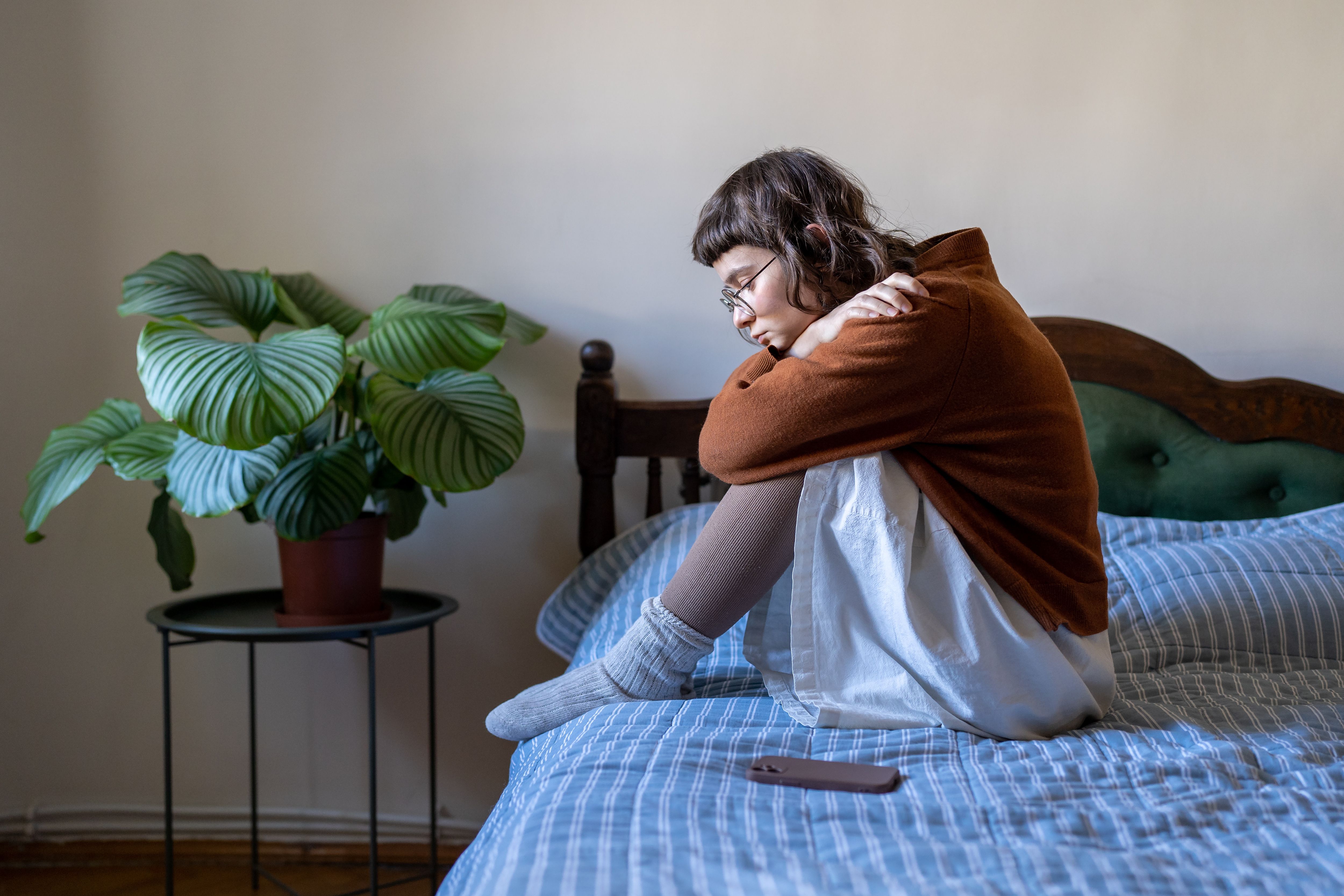 Depressed teenager -- Image credit: DimaBerlin | stock.adobe.com