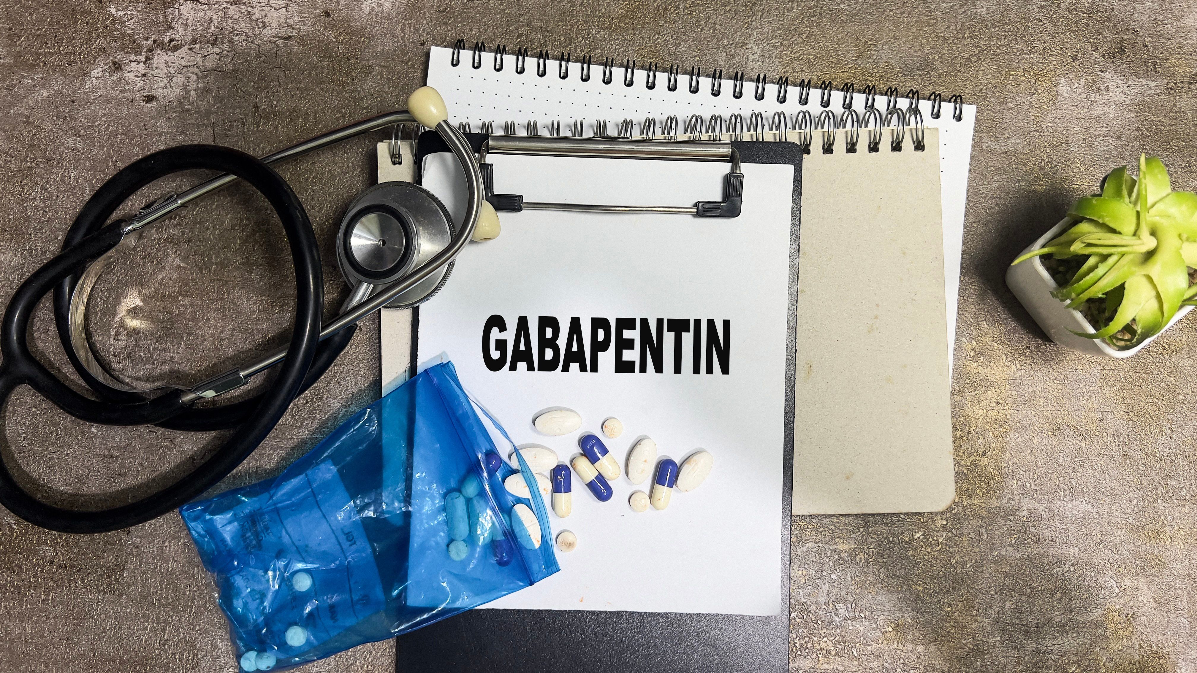 Concept of Gabapentin write on paperwork isolated on Wooden Table | Image Credit: Syahrir | stock.adobe.com