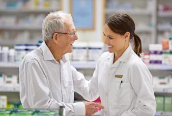 Pharmacist and elderly patient -- Image credit: Yuri Arcurs/peopleimages.com | stock.adobe.com