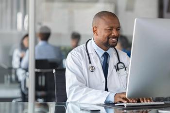 Pharmacist on computer