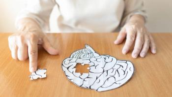 Older woman hands putting missing white jigsaw puzzle piece down into the place as a human brain shape. Creative idea for memory loss, dementia, Alzheimer's disease and mental health concept -  - Image credit: Orawan | stock.adobe.com