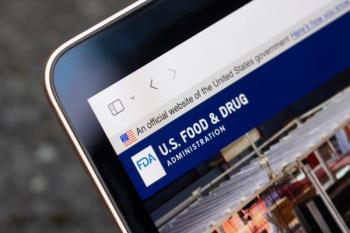 US FDA homepage on laptop -- Image credit: Tada Images | stock.adobe.com