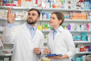 Professional pharmacists working together in modern drugstore | Image Credit: New Africa | stock.adobe.com