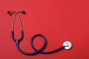 Stethoscope on the table. Medical instrument. Medical concept. Healthcare. Health Day. Doctor's equipment. Cardiology. Heart disease. Lung diagnostics. Diagnostics of respiratory inflammation