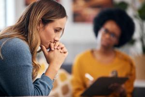 Women in therapy session -- Image credit: Talia Mdlungu/peopleimages.com | stock.adobe.com