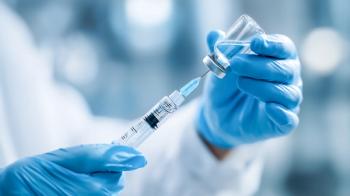 Close up hands of a doctor in glove is holding a medical syringe with a vaccine vial ready for injection vaccine. Injecting, Vaccination, Medicine flu | Image Credit: © Anthichada - stock.adobe.com