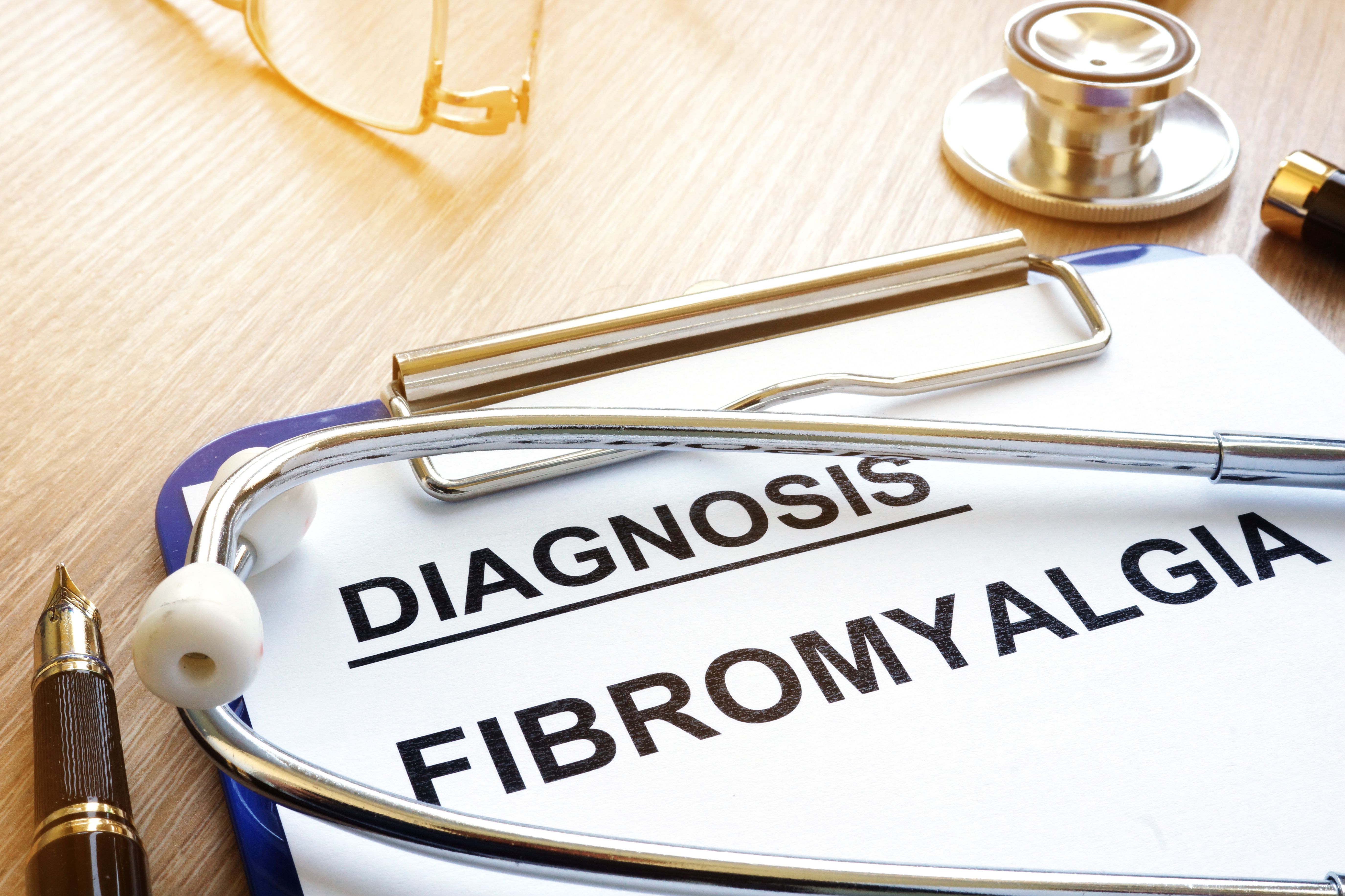 Diagnosis papers for fibromyalgia -- Image credit: Vitalii Vodolazskyi | stock.adobe.com
