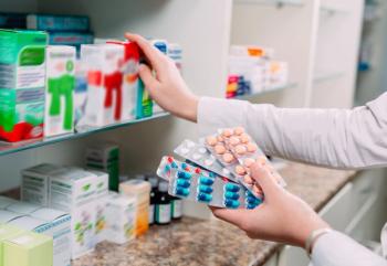 Pharmacist gathering medications -- Image credit: davit85 | stock.adobe.com