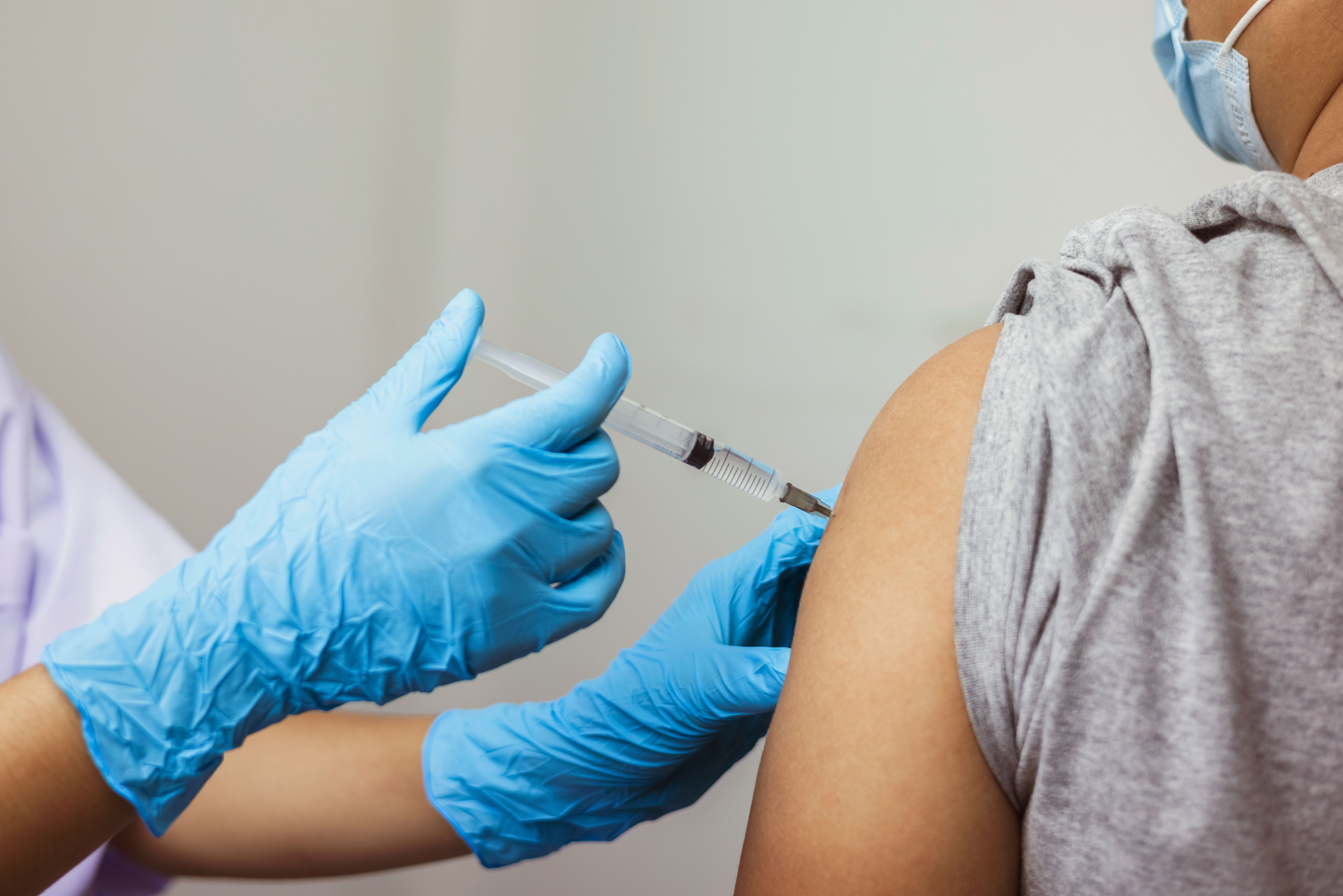 Woman receiving COVID vaccine -- Image credit: lovelyday12 | stock.adobe.com