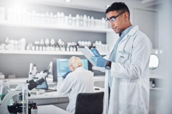 Pharmacy technician working in lab -- Image credit: J Bettencourt/peopleimages.com | stock.adobe.com